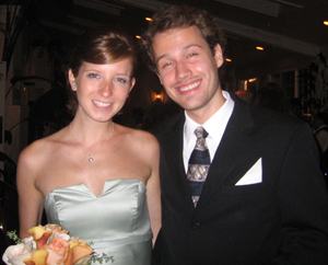 Andrew Uzilov and Kathleen Hutchison at a wedding.