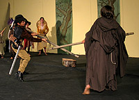 Friar Tuck and Robin Hood crossing staves